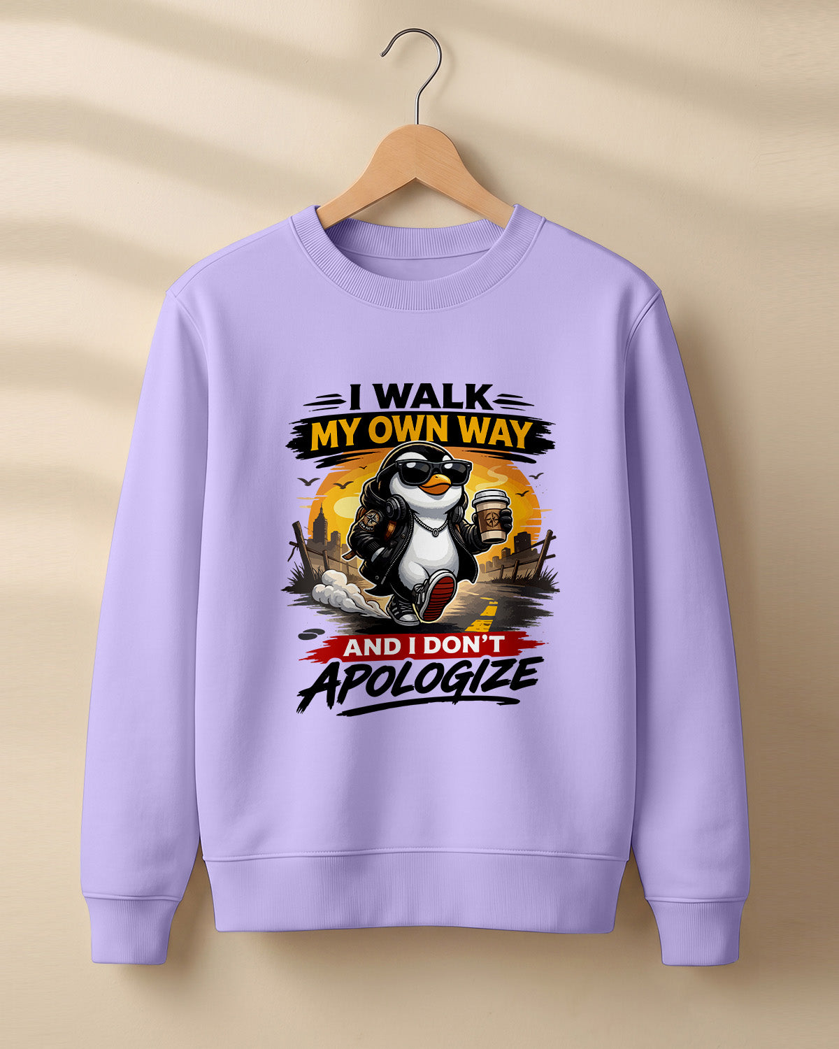 Sarcastic graphic sweatshirt featuring cool penguin artwork with I Walk My Own Way and I Don't Apologize quote printed on premium cotton fabric