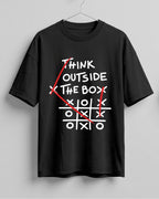 Graphic half sleeve oversized t-shirt featuring Think Outside the Box quote with tic-tac-toe graphic on cotton fabric