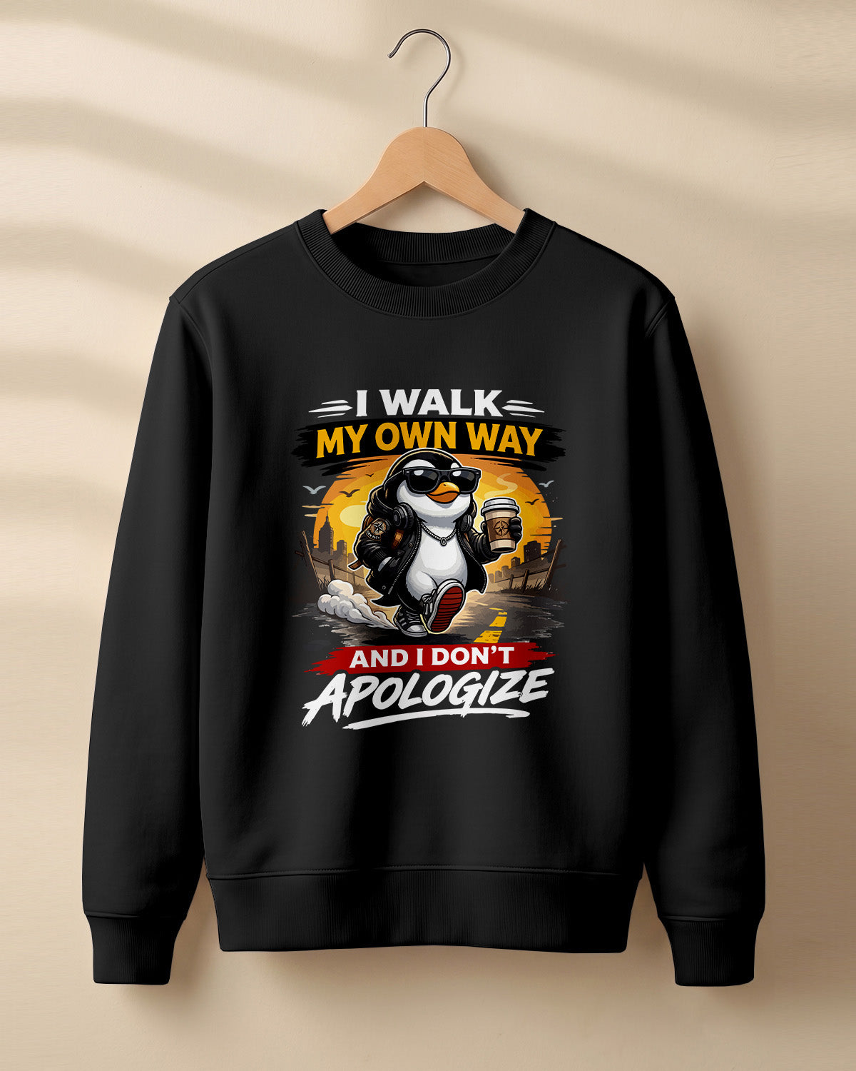Sarcastic graphic sweatshirt featuring cool penguin artwork with I Walk My Own Way and I Don't Apologize quote printed on premium cotton fabric