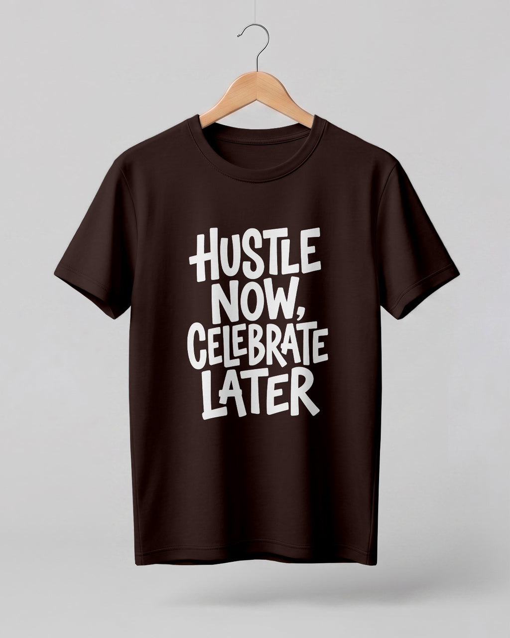 Motivational quote graphic half sleeve t-shirt featuring Hustle Now Celebrate Later typography design on premium cotton fabric