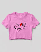 Motivational graphic crop top featuring You Make Me Smile typography design with heart graphic on cotton fabric