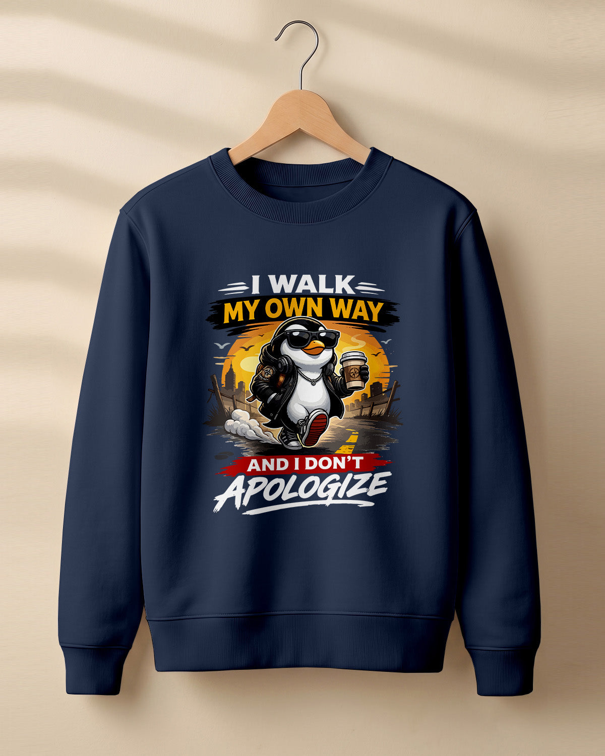 Sarcastic graphic sweatshirt featuring cool penguin artwork with I Walk My Own Way and I Don't Apologize quote printed on premium cotton fabric