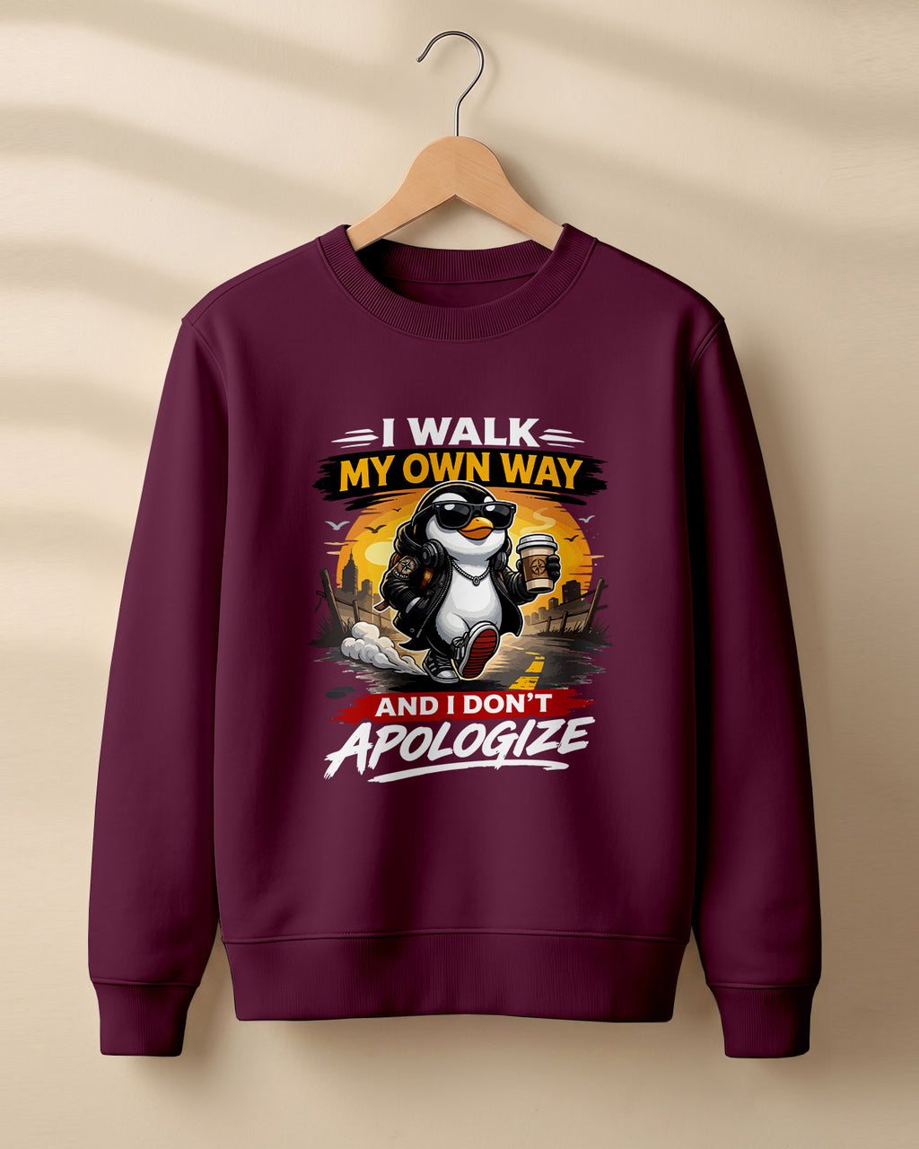 Sarcastic graphic sweatshirt featuring cool penguin artwork with I Walk My Own Way and I Don't Apologize quote printed on premium cotton fabric