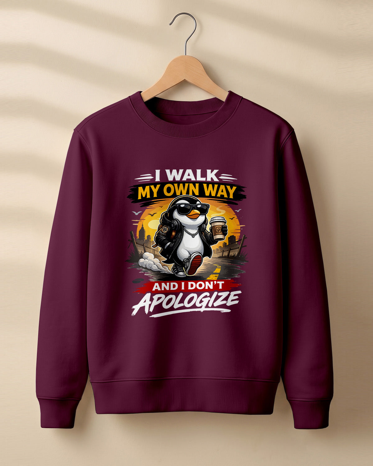 Sarcastic graphic sweatshirt featuring cool penguin artwork with I Walk My Own Way and I Don't Apologize quote printed on premium cotton fabric