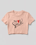 Motivational graphic crop top featuring You Make Me Smile typography design with heart graphic on cotton fabric