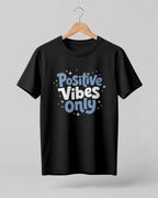 Motivational graphic half sleeve t-shirt featuring Positive Vibes Only typography design on premium cotton fabric.
