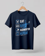 Motivational sports graphic half sleeve t-shirt featuring Eat Sleep Badminton Repeat typography with icons printed on premium cotton fabric.