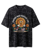 Motivational graphic oversized t-shirt featuring Positive Mind Positive Life typography design on acid washed cotton fabric