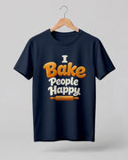 Foodie graphic half sleeve t-shirt featuring “I Bake People Happy” typography with rolling pin illustration printed on premium cotton fabric.