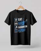 Motivational sports graphic half sleeve t-shirt featuring Eat Sleep Badminton Repeat typography with icons printed on premium cotton fabric.