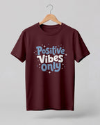 Motivational graphic half sleeve t-shirt featuring Positive Vibes Only typography design on premium cotton fabric.