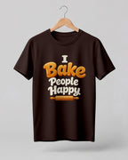 Foodie graphic half sleeve t-shirt featuring “I Bake People Happy” typography with rolling pin illustration printed on premium cotton fabric.