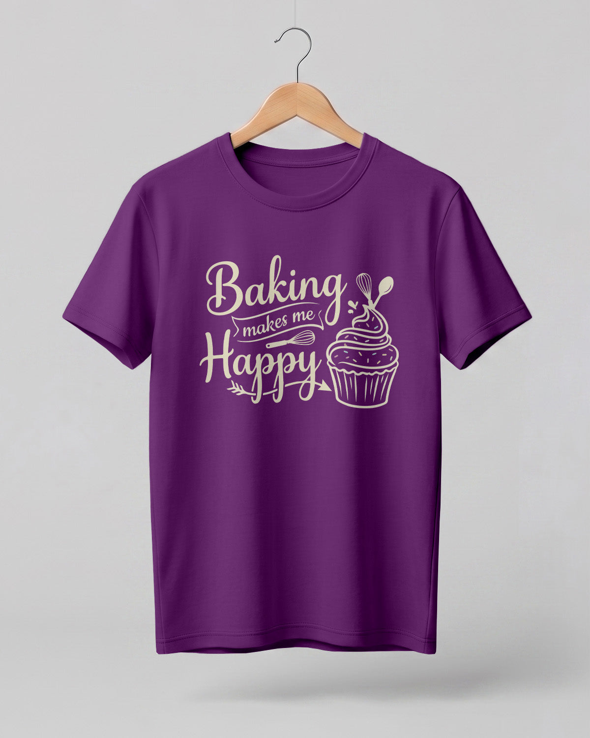 Foodie graphic half sleeve t-shirt featuring “Baking Makes Me Happy” typography with cupcake and whisk illustration printed on premium cotton fabric.