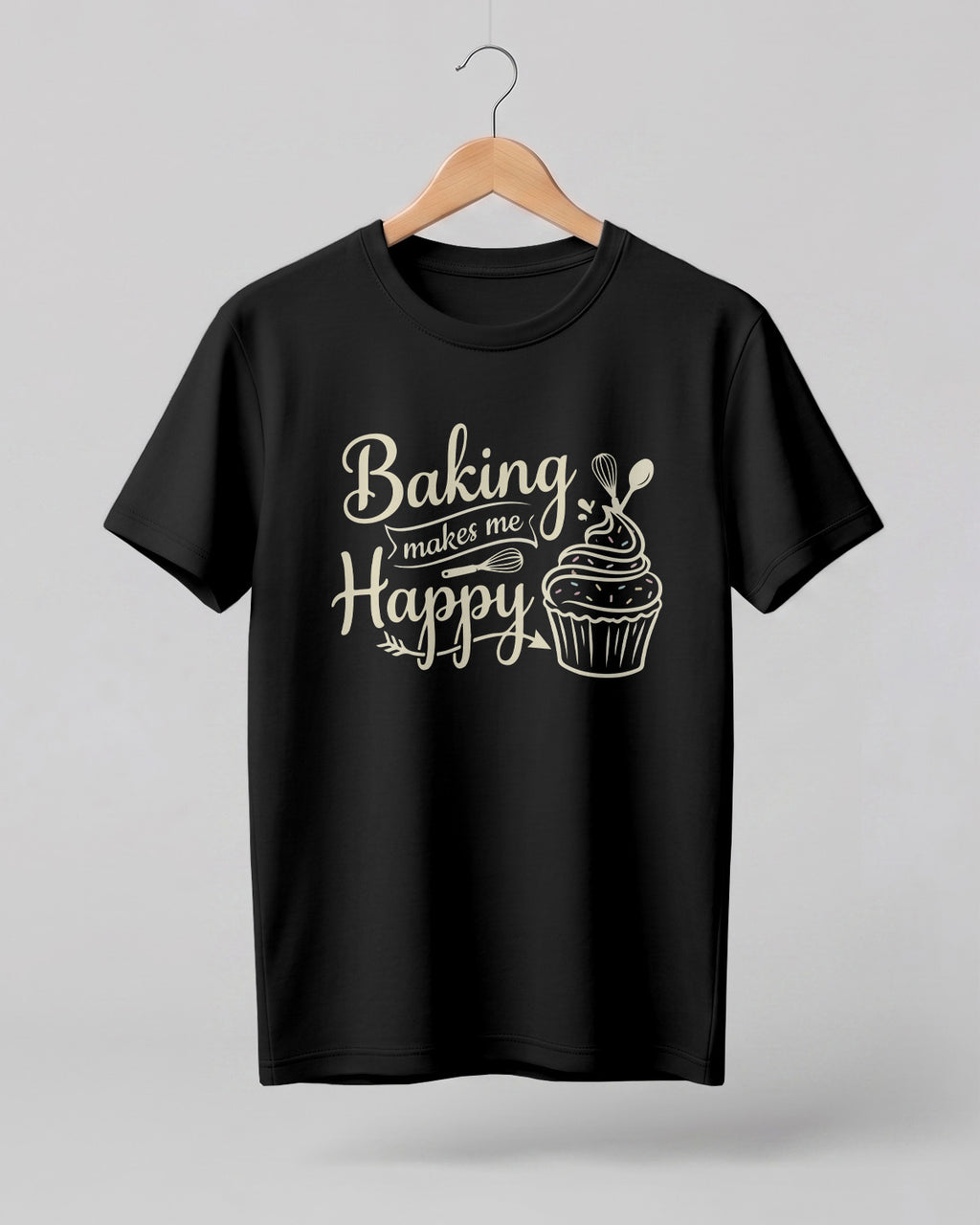 Foodie graphic half sleeve t-shirt featuring “Baking Makes Me Happy” typography with cupcake and whisk illustration printed on premium cotton fabric.