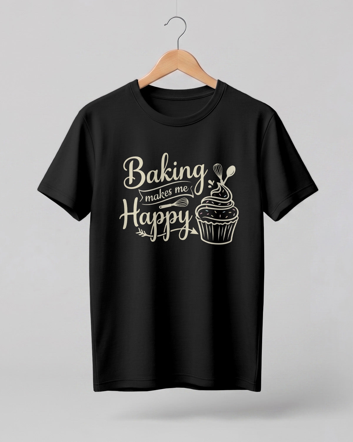Foodie graphic half sleeve t-shirt featuring “Baking Makes Me Happy” typography with cupcake and whisk illustration printed on premium cotton fabric.