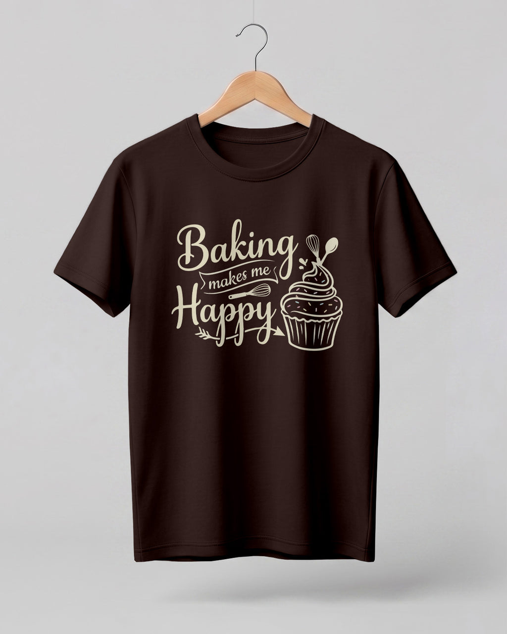 Foodie graphic half sleeve t-shirt featuring “Baking Makes Me Happy” typography with cupcake and whisk illustration printed on premium cotton fabric.