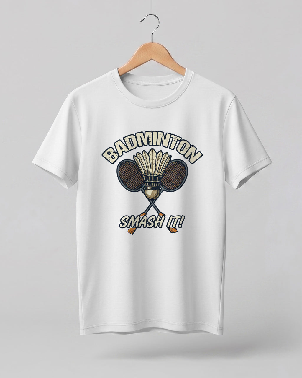Motivational sports graphic half sleeve t-shirt featuring “Badminton Smash It!” typography with crossed racket and shuttlecock design printed on premium cotton fabric.