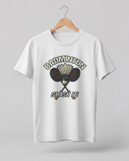 Motivational sports graphic half sleeve t-shirt featuring “Badminton Smash It!” typography with crossed racket and shuttlecock design printed on premium cotton fabric.