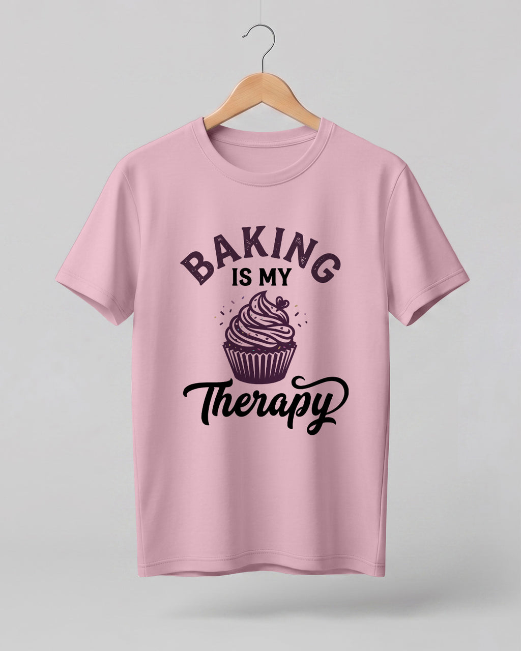 Foodie graphic half sleeve t-shirt featuring “Baking Is My Therapy” typography with cupcake illustration printed on premium cotton fabric.