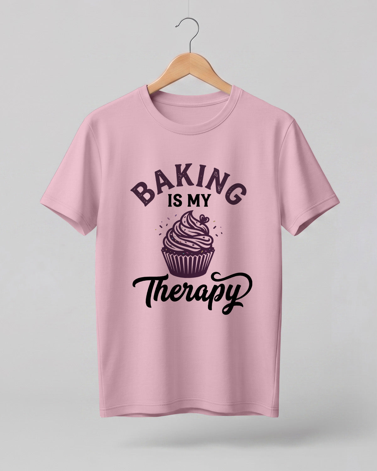 Foodie graphic half sleeve t-shirt featuring “Baking Is My Therapy” typography with cupcake illustration printed on premium cotton fabric.