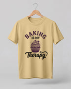 Foodie graphic half sleeve t-shirt featuring “Baking Is My Therapy” typography with cupcake illustration printed on premium cotton fabric.