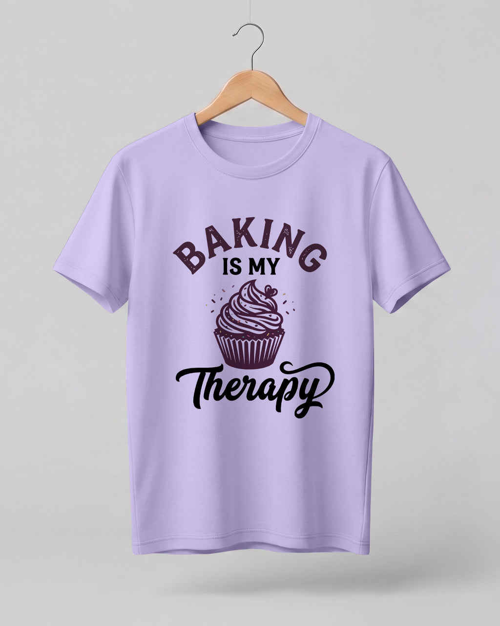 Foodie graphic half sleeve t-shirt featuring “Baking Is My Therapy” typography with cupcake illustration printed on premium cotton fabric.