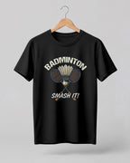 Motivational sports graphic half sleeve t-shirt featuring “Badminton Smash It!” typography with crossed racket and shuttlecock design printed on premium cotton fabric.