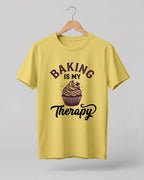 Foodie graphic half sleeve t-shirt featuring “Baking Is My Therapy” typography with cupcake illustration printed on premium cotton fabric.