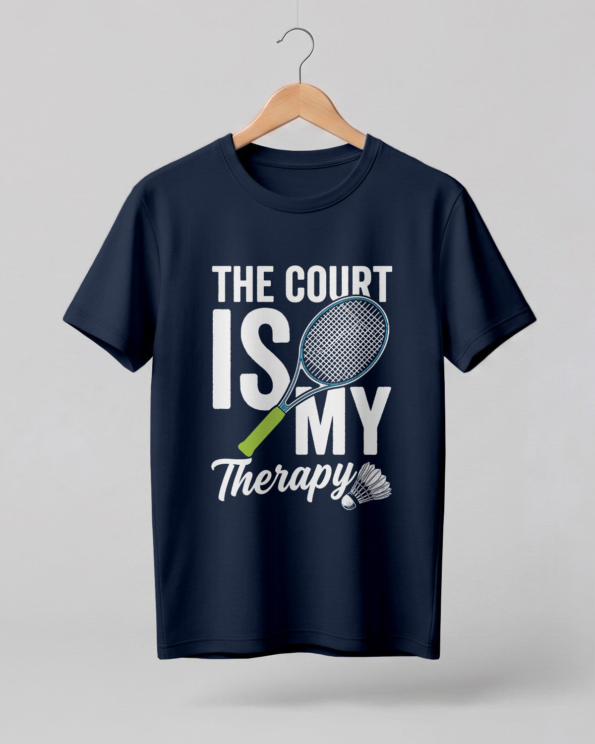 Motivational sports graphic half sleeve t-shirt featuring “The Court Is My Therapy” typography with badminton racket and shuttlecock design printed on premium cotton fabric.