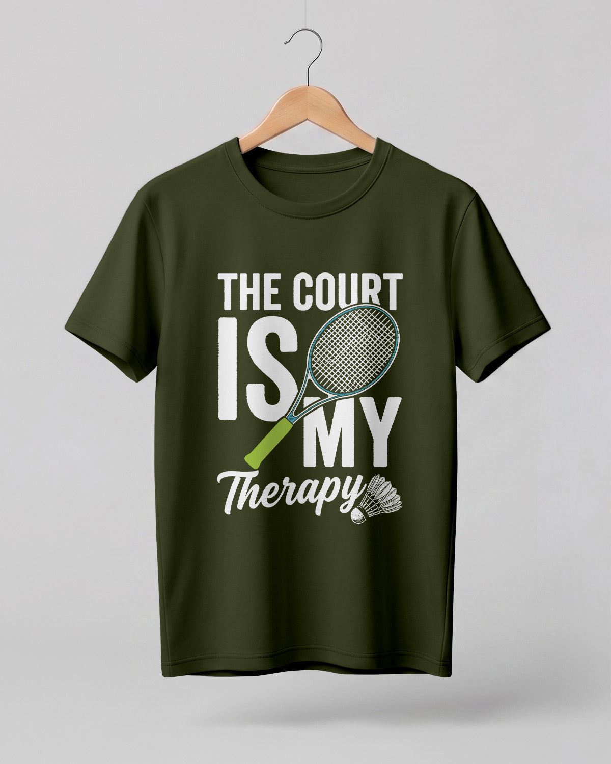 Motivational sports graphic half sleeve t-shirt featuring “The Court Is My Therapy” typography with badminton racket and shuttlecock design printed on premium cotton fabric.