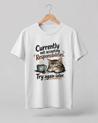 Sarcasm niche half sleeve round neck t-shirt featuring “Not Accepting Responsibilities” print with sleeping cat illustration.