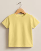 Light Yellow plain cotton kids half sleeve round neck t-shirt made from premium cotton, 180 GSM red label yarn, biowashed for softness and durability.