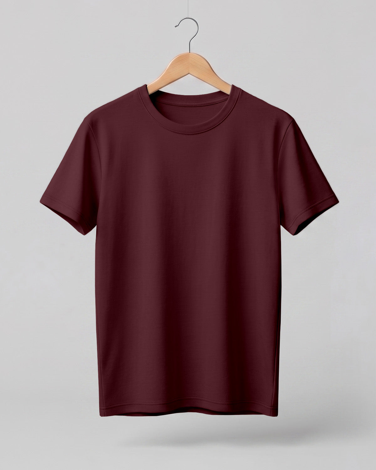 Maroon plain half sleeve round neck t-shirt made from premium cotton, 180 GSM red label yarn, biowashed for softness and durability.
