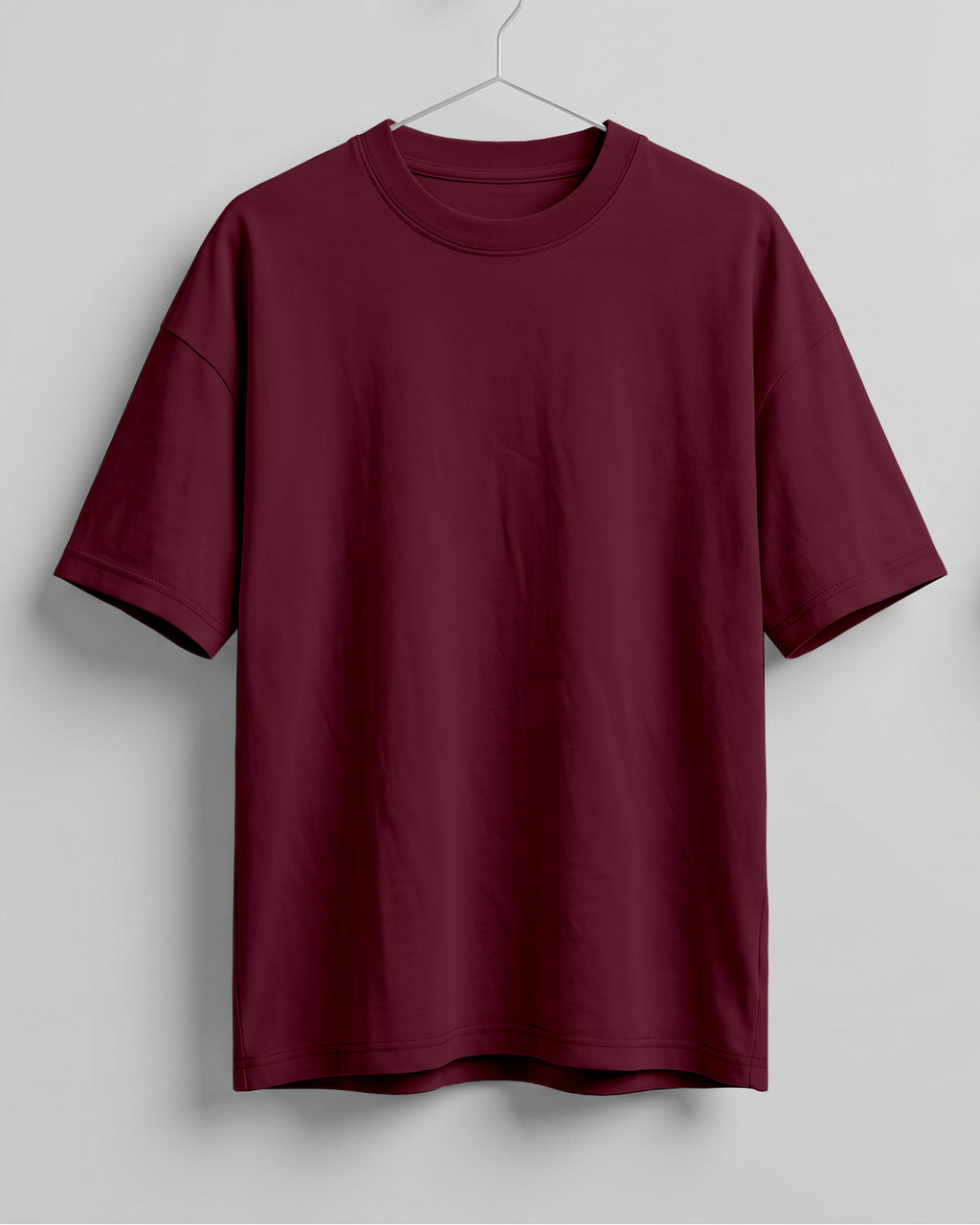 Maroon oversized plain half sleeve round neck t-shirt made from premium cotton 180 GSM red label yarn, biowashed for softness.
