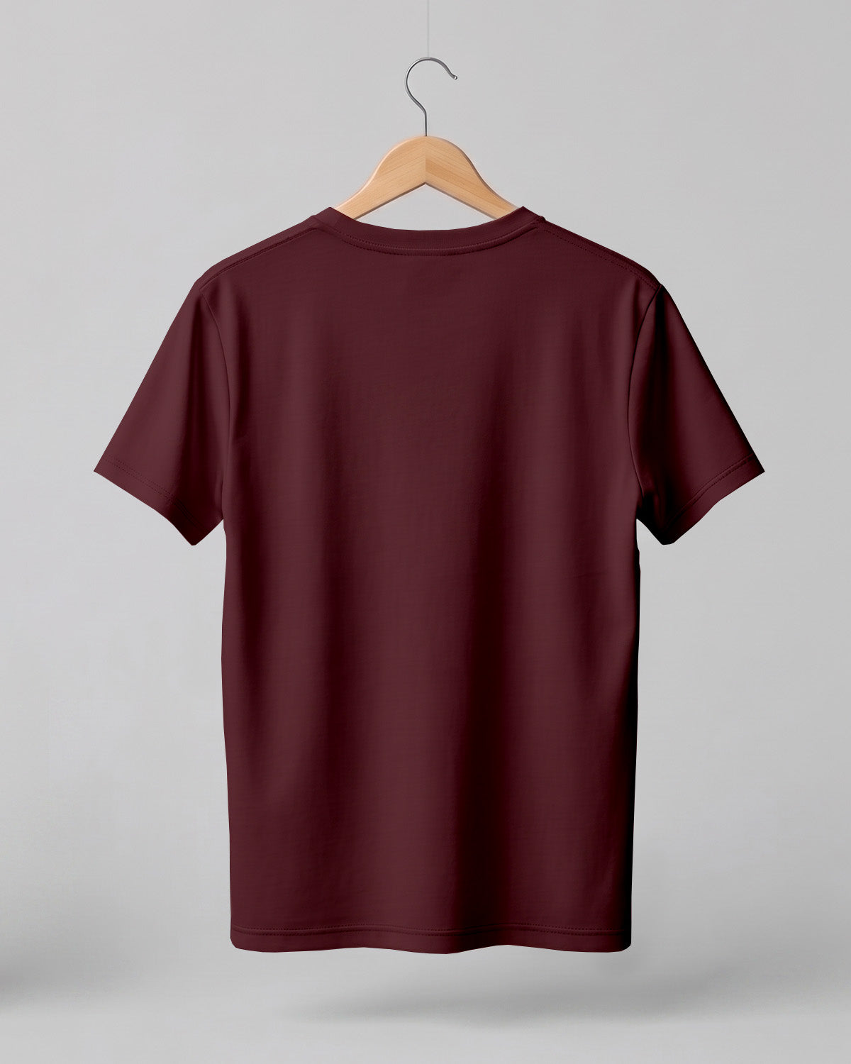 Maroon plain half sleeve round neck t-shirt made from premium cotton, 180 GSM red label yarn, biowashed for softness and durability.