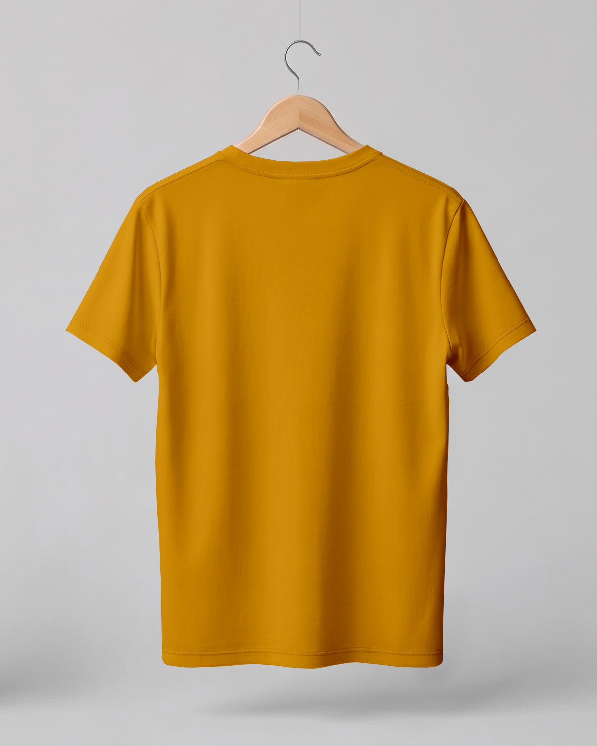 Mustard Yellow plain half sleeve round neck t-shirt made from premium cotton, 180 GSM red label yarn, biowashed for softness and durability.