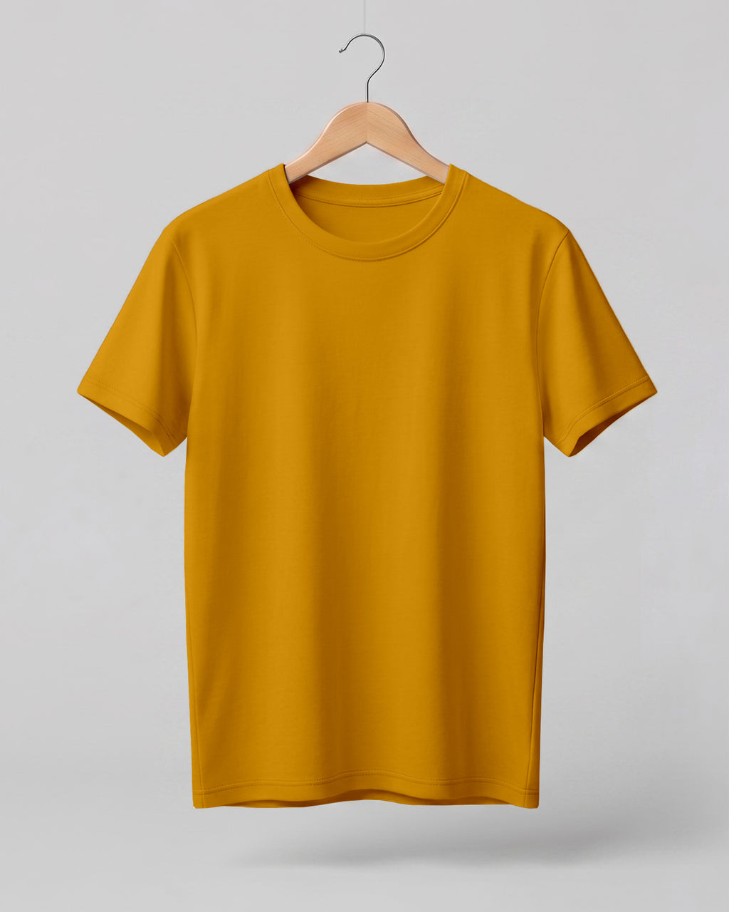 Mustard Yellow plain half sleeve round neck t-shirt made from premium cotton, 180 GSM red label yarn, biowashed for softness and durability.
