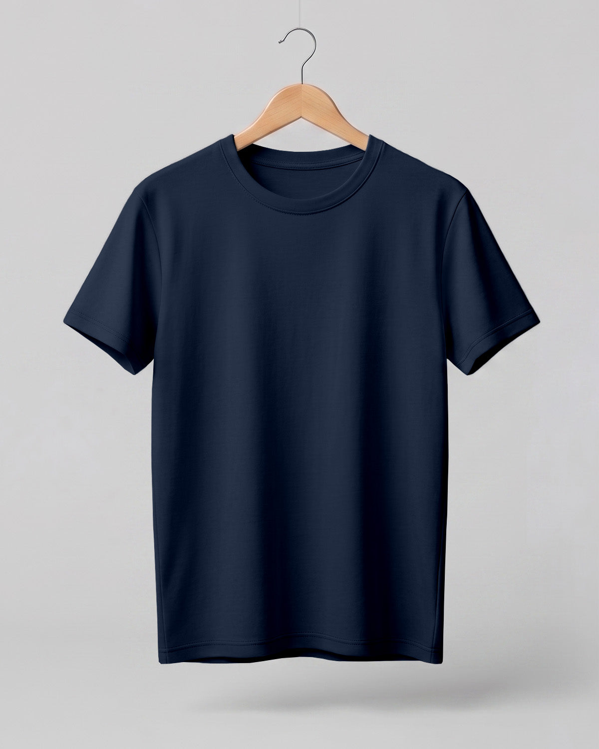 Navy blue plain half sleeve round neck t-shirt made from premium cotton, 180 GSM red label yarn, biowashed for softness and durability.