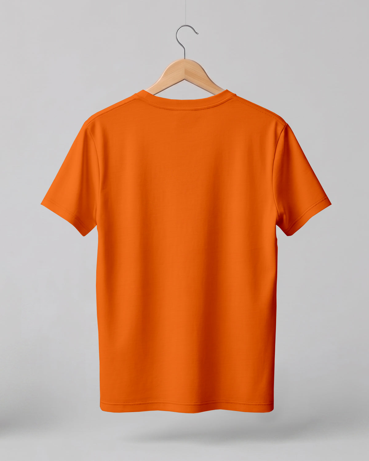 Orange plain half sleeve round neck t-shirt made from premium cotton, 180 GSM red label yarn, biowashed for softness and durability.