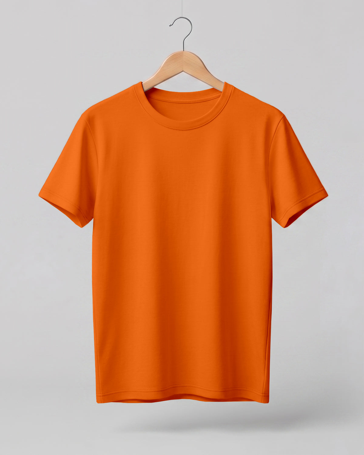 Orange plain half sleeve round neck t-shirt made from premium cotton, 180 GSM red label yarn, biowashed for softness and durability.