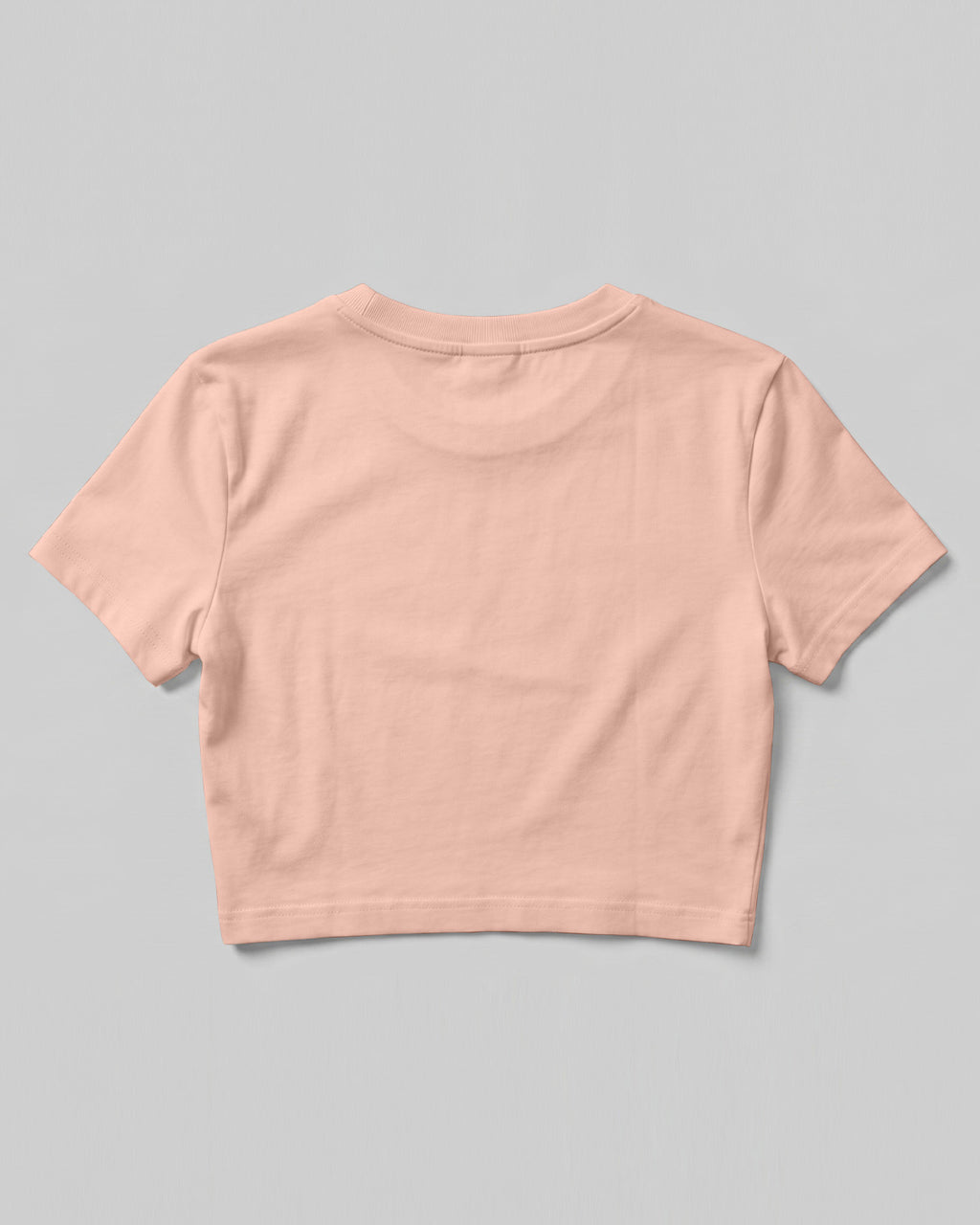 Peach plain cap sleeve crop top made from premium cotton, 180 GSM red label yarn, biowashed for softness and durability.