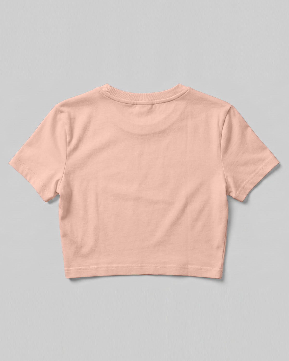 Peach plain cap sleeve crop top made from premium cotton, 180 GSM red label yarn, biowashed for softness and durability.
