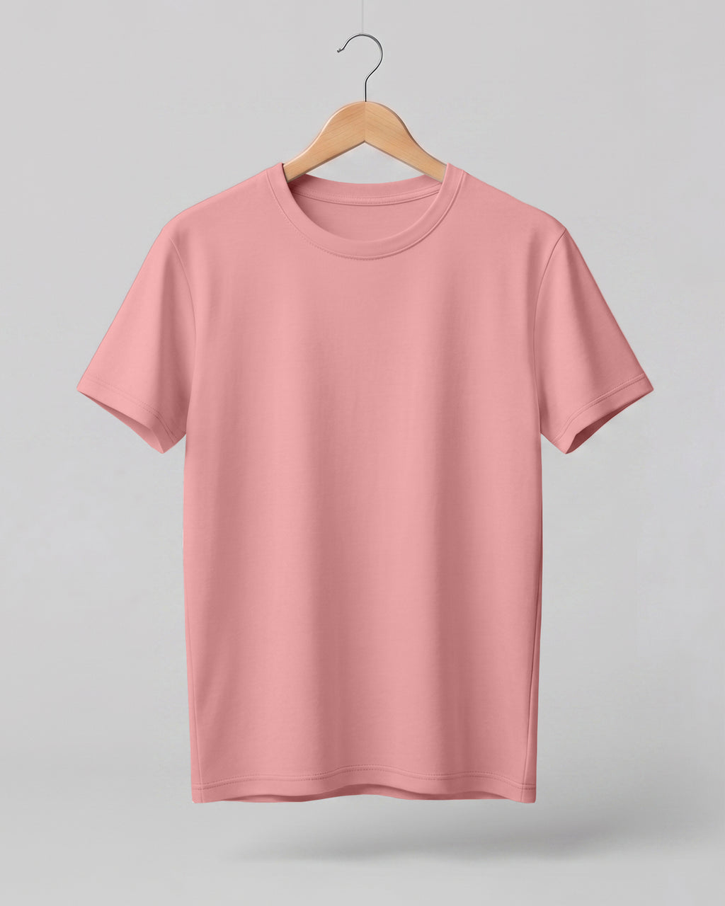 Peach plain half sleeve round neck t-shirt made from premium cotton, 180 GSM red label yarn, biowashed for softness and durability.