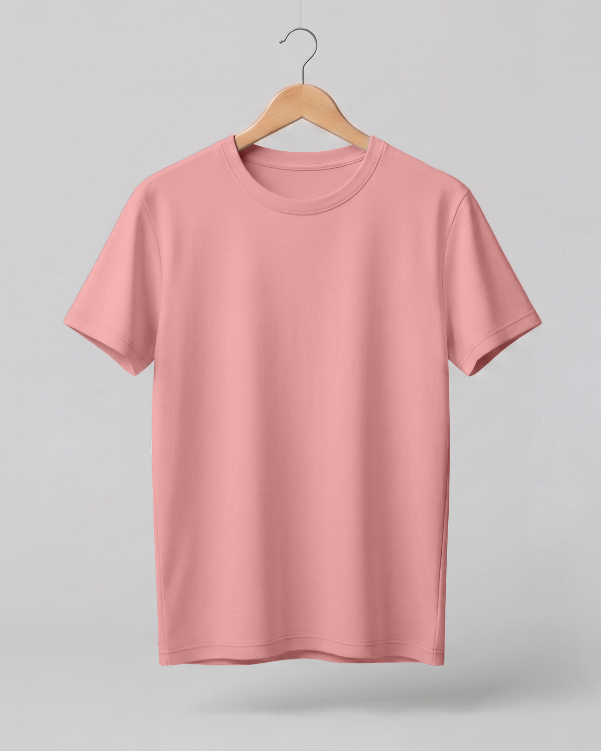 Peach plain half sleeve round neck t-shirt made from premium cotton, 180 GSM red label yarn, biowashed for softness and durability.