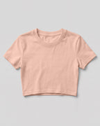Peach plain cap sleeve crop top made from premium cotton, 180 GSM red label yarn, biowashed for softness and durability.