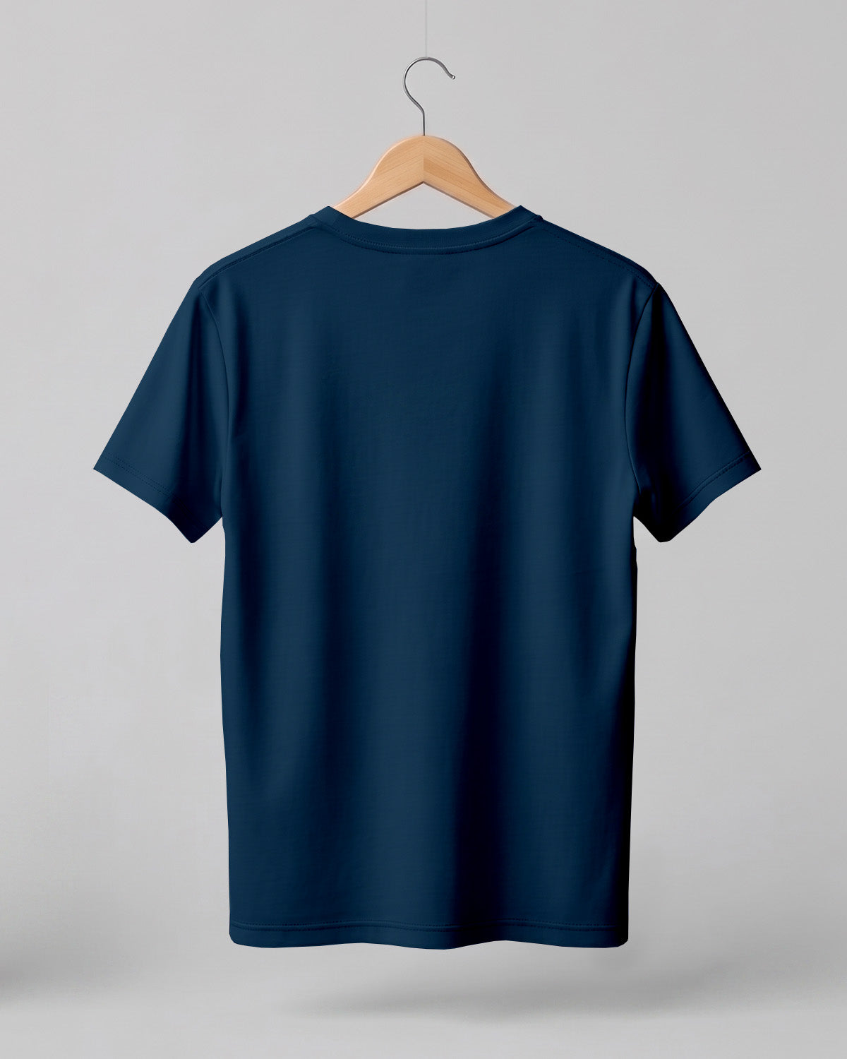 The Petrol Blue Plain Half Sleeve T-Shirt offers deep sophistication with everyday ease. Made from premium cotton, 180 GSM red label yarn, and biowashed for softness, this round neck tee combines durability with timeless appeal. Its rich petrol blue shade adds depth to casual wear, college outfits, or daily styling. Perfect for pairing with denim, chinos, or layered looks, it’s a versatile essential for a grounded yet stylish wardrobe.