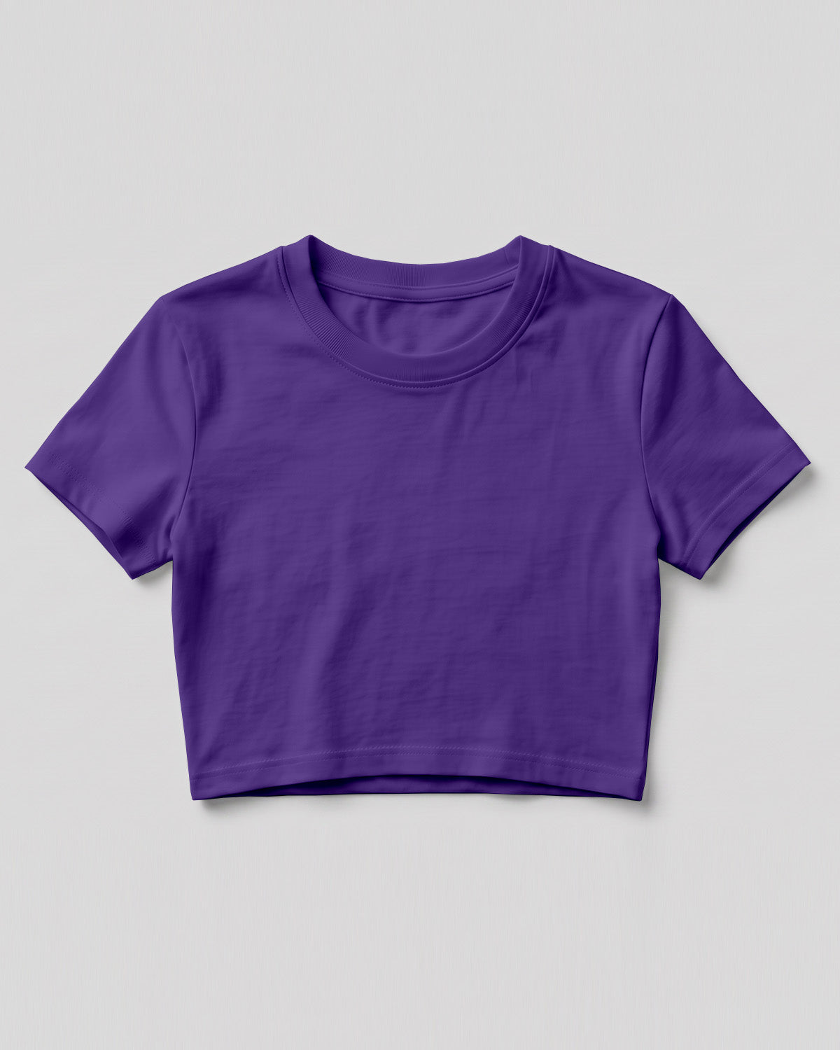 Purple plain crop top made from premium cotton, 180 GSM yarn, biowashed for softness and durability.