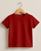Red plain cotton kids half sleeve round neck t-shirt made from premium cotton, 180 GSM yarn, biowashed for softness and durability.