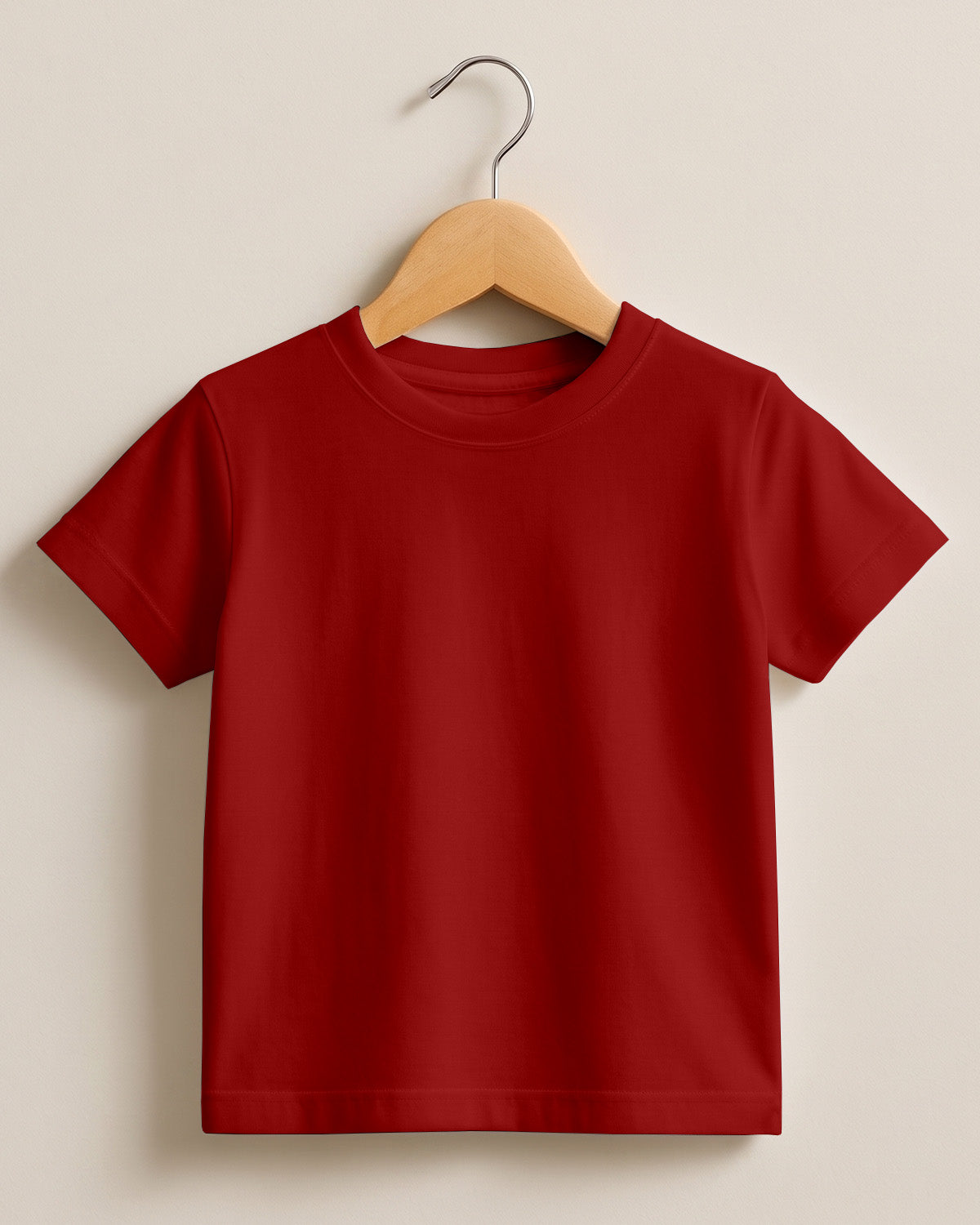 Red plain cotton kids half sleeve round neck t-shirt made from premium cotton, 180 GSM yarn, biowashed for softness and durability.