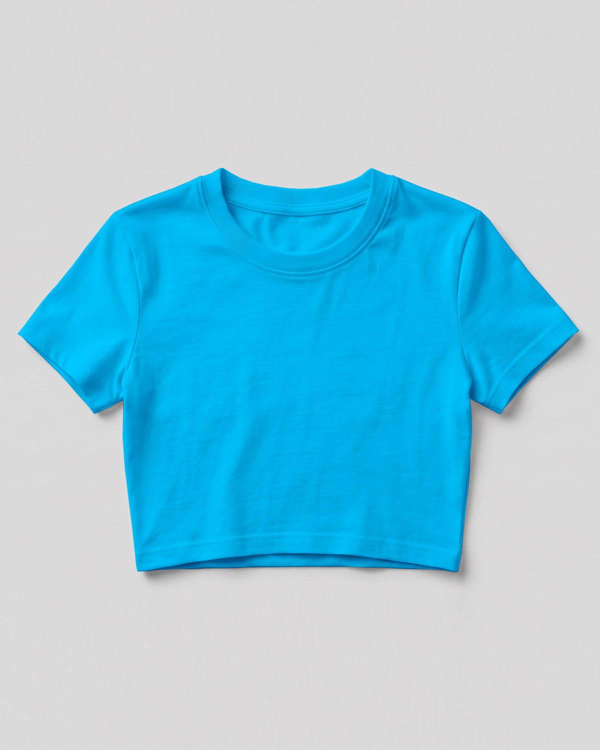 Sky Blue plain crop top made from premium cotton, 180 GSM red label yarn, biowashed for softness and durability.